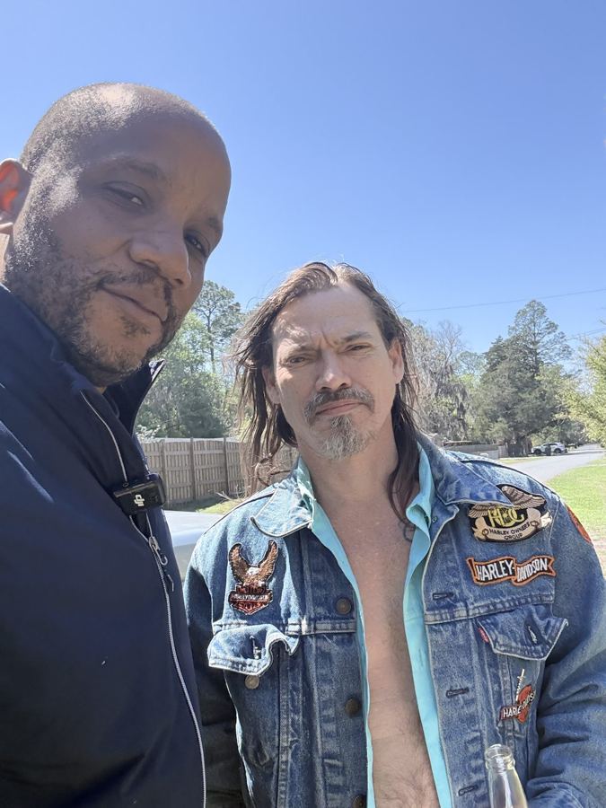 Chris with a client outdoors