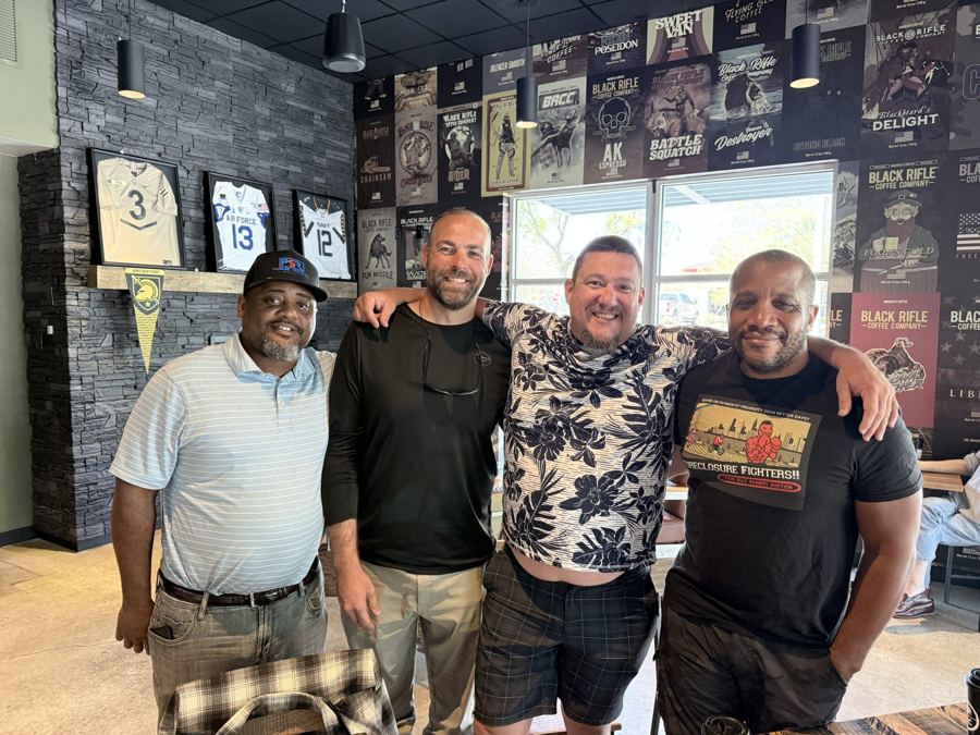 Chris with three colleagues